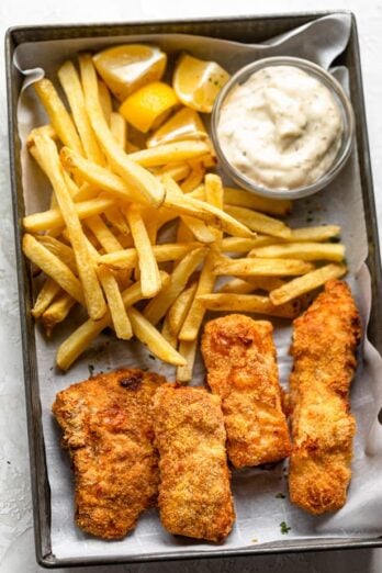 Air fried fish and chips served with tartar saucse and lemon wedge