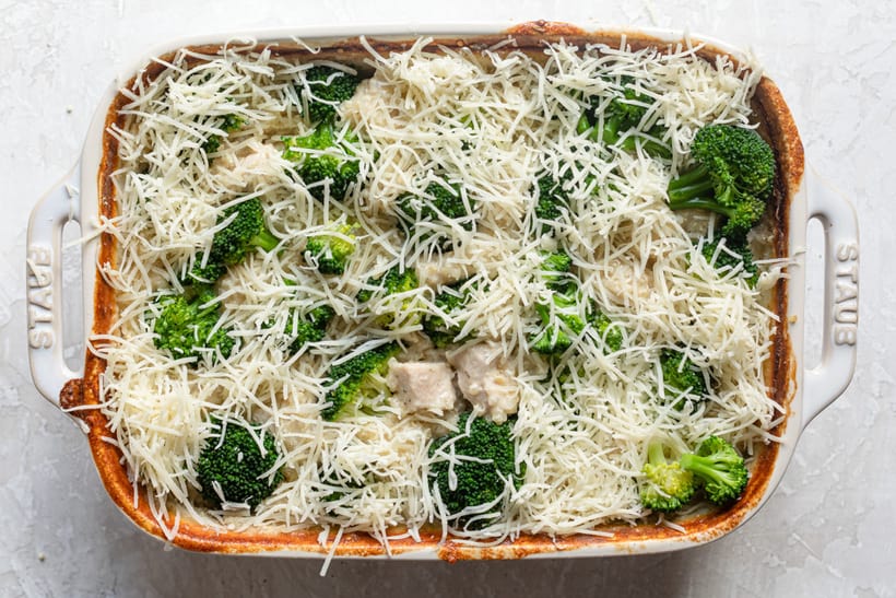 Adding cheese and broccoli before baking in the oven