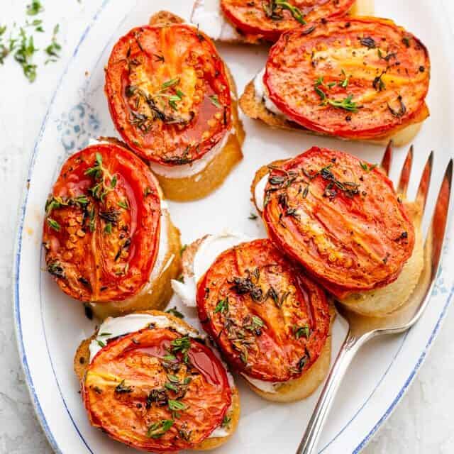 Final crostini with roasted tomatoes appetizer dish