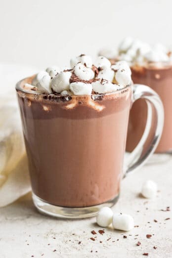 Glass of hot chocolate topped with mini marshmallows