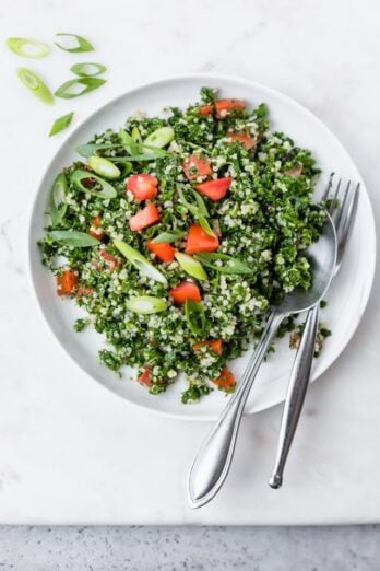 Plate of the of final quinoa tabbouleh recipe garnished with green onions