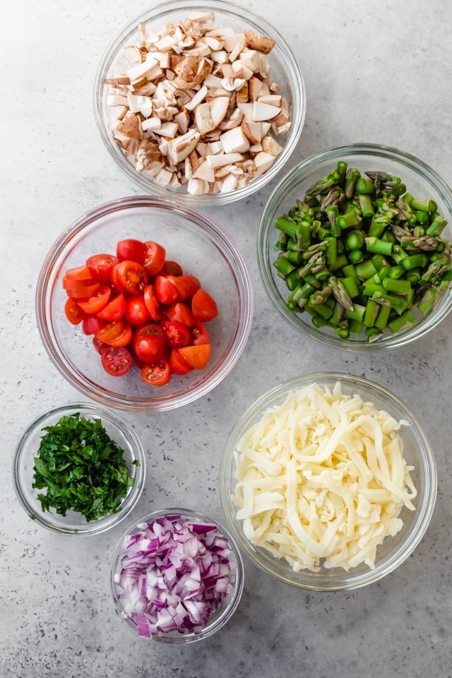 Ingredients to make the recipe aside from eggs, cheese, asparagus, mushrooms, onions, tomatoes and cilantro